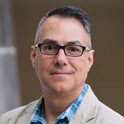 Headshot of Luiz Antunes.