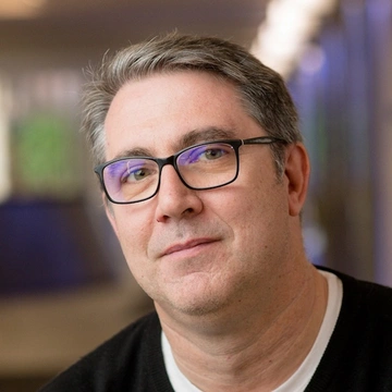 Headshot of Jerome Hugues.