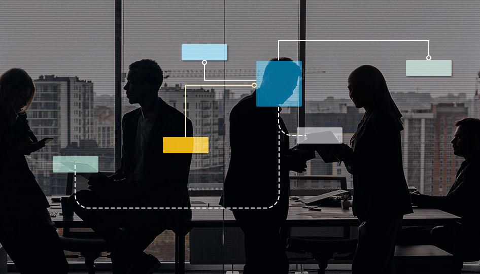 A group of office workers with a node graph overlaid onto one of them.