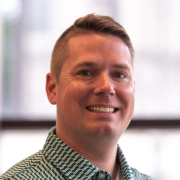 Headshot of Kevin Dooley.