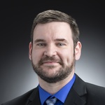 Headshot of Joseph McIlvenny.