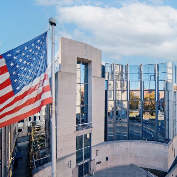 Exterior of the SEI Building in Pittsburgh with U.S. Flag.