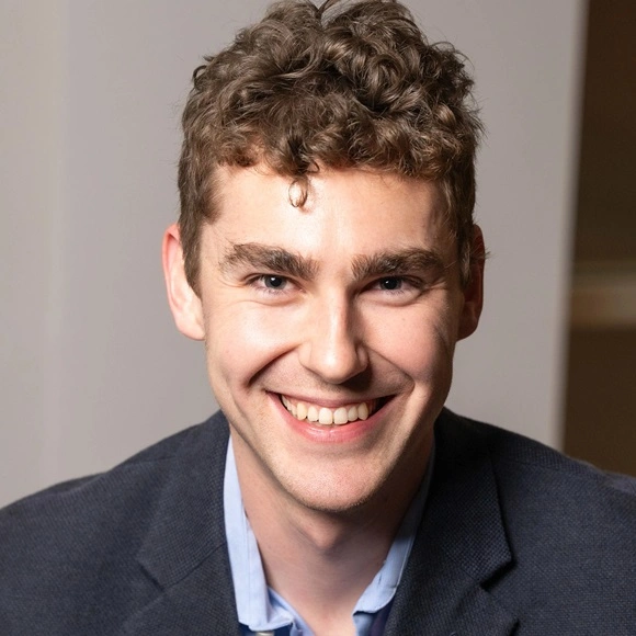 Headshot of Grant Schumock.