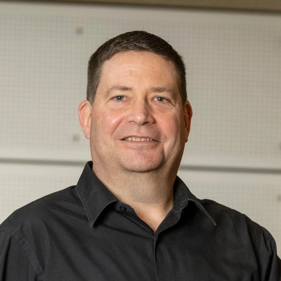 Headshot of John Stogoski.