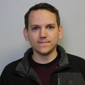 Headshot of Jarrett Booz.