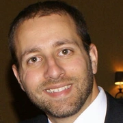 Headshot of C. Aaron Cois.