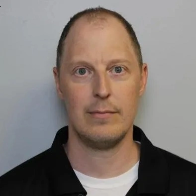 Headshot of Christopher Herr.