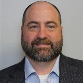 Headshot of Christopher Miller.