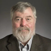 Headshot of David Mundie.