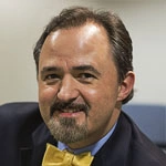 Headshot of Doug Gray.