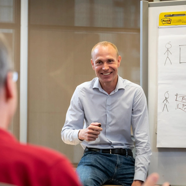 An SEI researcher delivering a presentation.