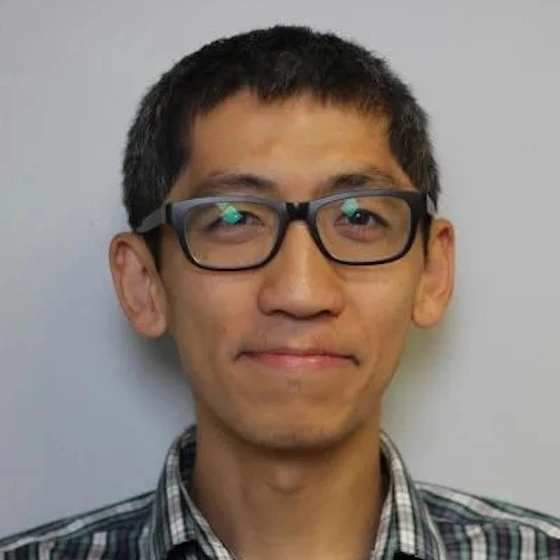 Headshot of Shen Zhang.