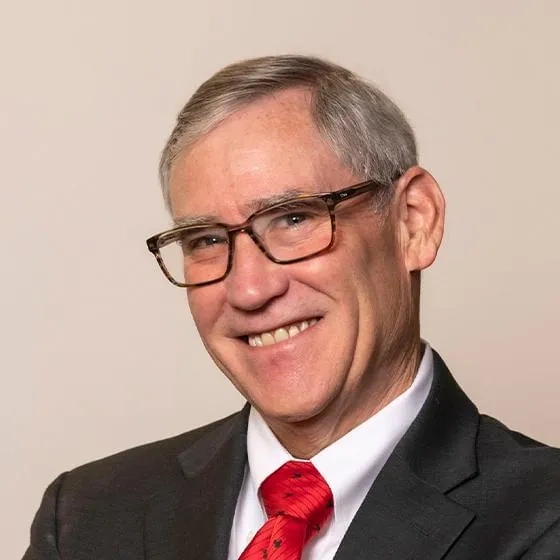 Headshot of Tom Longstaff.