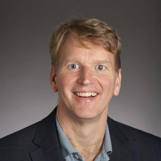 Headshot of Andrew Moore.