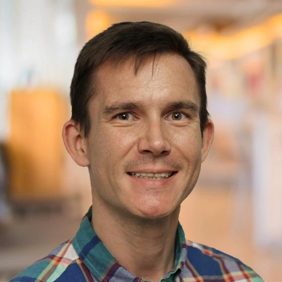 Headshot of Aaron Reffett.