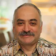 Headshot of Alfred Schenker.