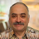 Headshot of Alfred Schenker.