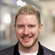 Headshot of Aaron Volkmann.