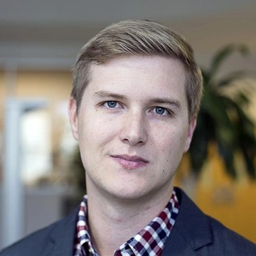 Headshot of Christopher King.