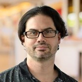 Headshot of Dan J Klinedinst.