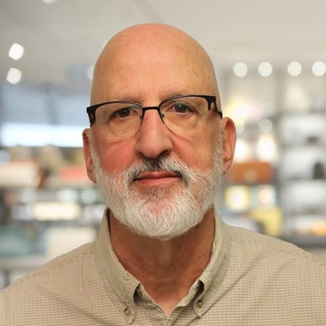 Headshot of Mark Kasunic.