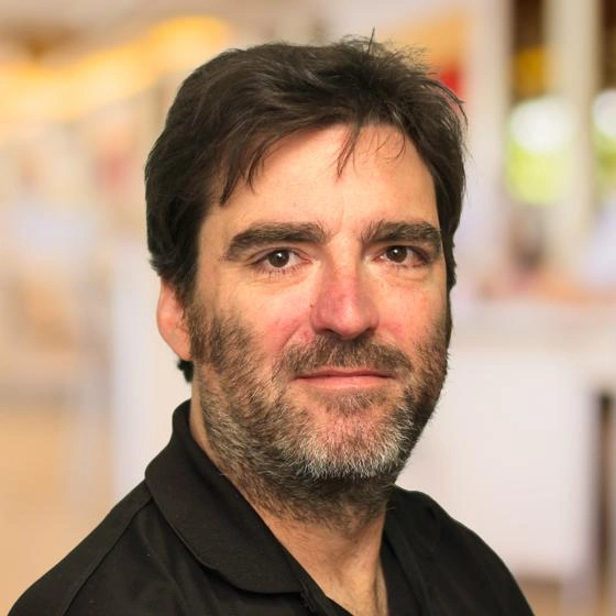 Headshot of Matthew Sisk.