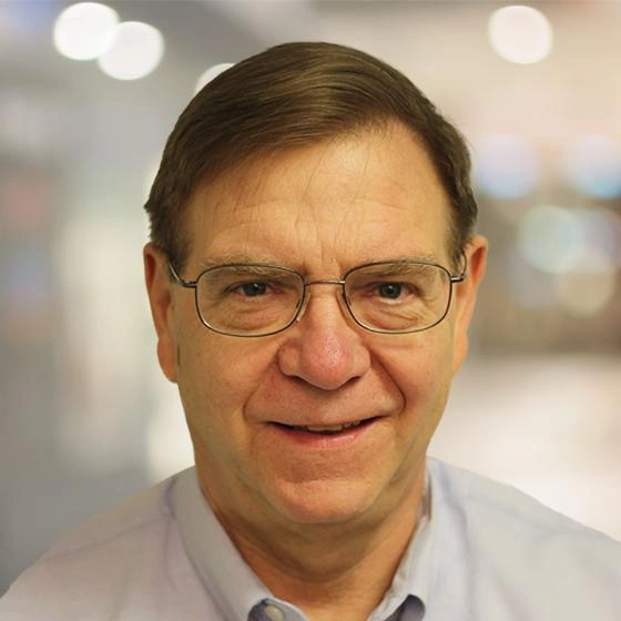 Headshot of Paul Krystosek.