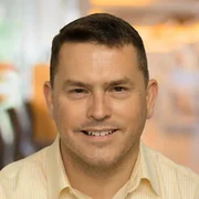 Headshot of Thomas Evans.